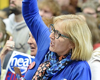 Jeff Lange | The Vindicator  SAT, MAR 12, 2016 - A Hillary supporter cheers as Democratic presidential candidate Hillary Clinton speaks during a rally in Youngstown Saturday night.