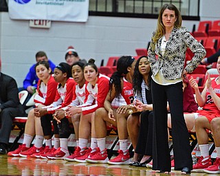YOUNGSTOWN, OHIO - MARCH 16, 2016: Head coach Caroline McCombs of Stoney Brook watches from the sideline during their 2nd half of their game Wednesday night at Beeghly Center. DAVID DERMER | THE VINDICATOR