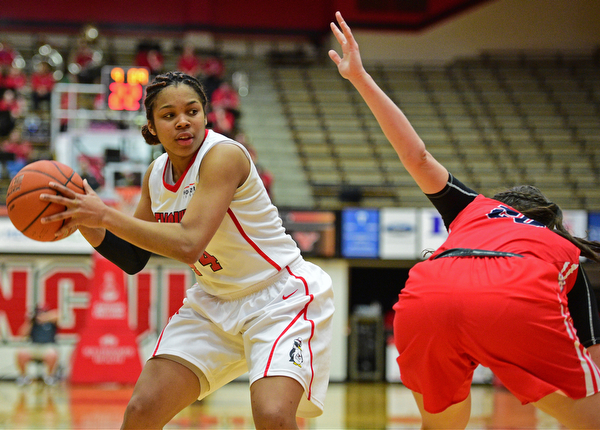YOUNGSTOWN, OHIO - MARCH 16, 2016: Janae Jackson #44 of YSU goes to the basket after Brittany Snow #20 of Stoney Brook lost her balance while playing defense during their 2nd half of their game Wednesday night at Beeghly Center. DAVID DERMER | THE VINDICATOR