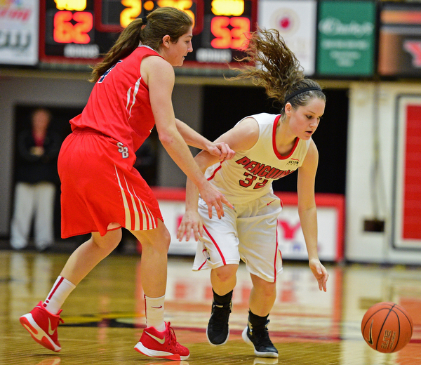 YOUNGSTOWN, OHIO - MARCH 16, 2016: Jenna Hirsch #32 of YSU loses control of the ball while being pressured by Christa Scognamiglio #4 of Stoney Brook during their 2nd half of their game Wednesday night at Beeghly Center. DAVID DERMER | THE VINDICATOR