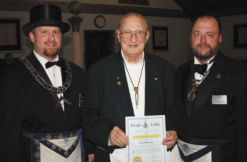 SPECIAL TO THE VINDICATOR | Argus Masonic Lodge 545, Canfield, honored Paul M. Remias of Youngstown for his 60 years of membership on Feb. 26 during the Lodge’s annual awards night. Remias was awarded a gold pin. Guests of the meeting were Robert W. Ridzon and the family of Remias. Master of Ceremonies and photographer for the event was Denny Furman. Ryan Hamilton, left, presented the award to Remias with Ridzon. The Masons value charity highly, with 121,000 Ohioan Masons donating approximately $15 million every year. This year, $97,000 was donated in college scholarships, $125,000 to Special Olympics and $70,000 to provide free training for hundreds of Ohio school teachers to learn to recognize students who have a nonacademic risk. The Masons also provided $12 million in elderly care and helped many other needy families and individuals through the group’s Charitable Foundation. Information is available at www.freemason.com. For local information, go to www.arguslodge.com or contact Russell W. Gillam III at 330-953-7935.