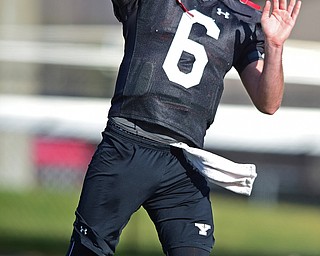YOUNGSTOWN, OHIO - MARCH 18, 2016: Hunter Wells #6 of YSU throws a pass during a drill during the teams practice Friday afternoon at Stambaugh Stadium. DAVID DERMER | THE VINDICATOR