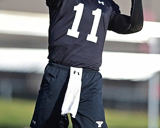YOUNGSTOWN, OHIO - MARCH 18, 2016: Trent Hosick #11 of YSU throws a pass during a drill during the teams practice Friday afternoon at Stambaugh Stadium. DAVID DERMER | THE VINDICATOR