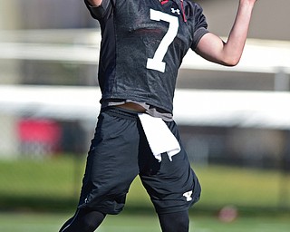 YOUNGSTOWN, OHIO - MARCH 18, 2016: Nathan Mays #7 of YSU throws a pass during a drill during the teams practice Friday afternoon at Stambaugh Stadium. DAVID DERMER | THE VINDICATOR