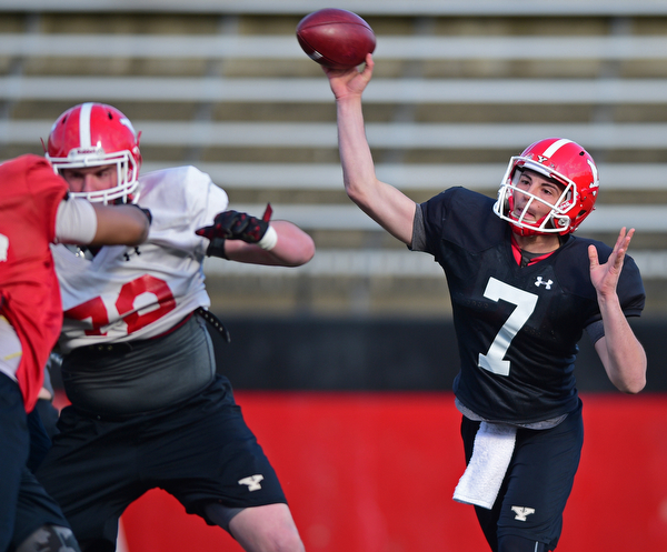 YOUNGSTOWN, OHIO - MARCH 18, 2016: Nathan Mays #7 of YSU throws a pass during a drill during the teams practice Friday afternoon at Stambaugh Stadium. DAVID DERMER | THE VINDICATOR