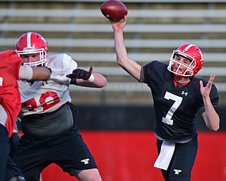 YOUNGSTOWN, OHIO - MARCH 18, 2016: Nathan Mays #7 of YSU throws a pass during a drill during the teams practice Friday afternoon at Stambaugh Stadium. DAVID DERMER | THE VINDICATOR