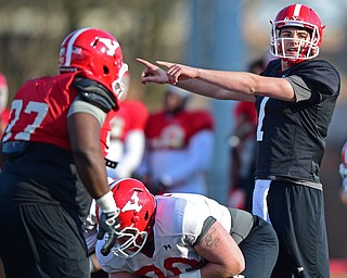 YOUNGSTOWN, OHIO - MARCH 18, 2016: Nathan Mays #7 of YSU identifies the blitzing defender during a drill during the teams practice Friday afternoon at Stambaugh Stadium. DAVID DERMER | THE VINDICATOR