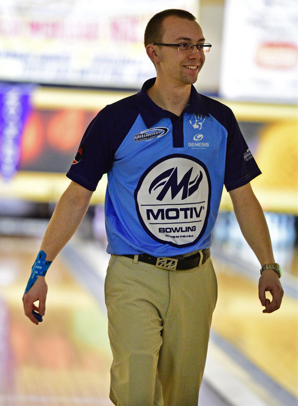 HUB BARD, OHIO - MARCH 20, 2016: E.J. Tackett smiles after throwing a strike during the final rounds of the Hubbard Open Sunday afternoon at the Bell-Wick bowling alley. DAVID DERMER | THE VINDICATOR