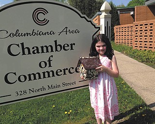 SPECIAL TO THE VINDICATOR | The Columbiana Area Chamber of Commerce will sponsor a birdhouse decorating contest during Springtime in Columbiana on May 6 and 7. Above is Canna Holmes, a 2015 contestant. Birdhouse kits are available at the chamber office, 333 N. Main St., from 9 a.m. to noon Monday through Friday and should be returned during the same hours by May 4. Bird houses are made of earth-friendly material and require a $5 donation. Participants also may enter a self-designed bird house for a $5 donation. Bird houses will be displayed May 6 and 7. Awards of $25 will be given to winners in each category for age 10 and under, 11 to 17 and 18 and older. For information, call the chamber office at 330-482-3822.