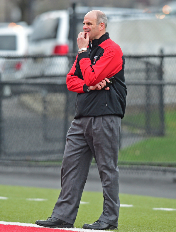 YOUNGSTOWN, OHIO - MARCH 23, 2016: YSU Athletic Director Ron Strollo watches football practice Wednesday afternoon at Stambaugh Stadium. DAVID DERMER | THE VINDICATOR