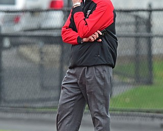YOUNGSTOWN, OHIO - MARCH 23, 2016: YSU Athletic Director Ron Strollo watches football practice Wednesday afternoon at Stambaugh Stadium. DAVID DERMER | THE VINDICATOR