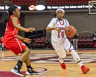 Advertiser photo by Buddy Delahoussaye--Cajuns guard Kia Wilridge (10) driving to the basket on Wednesday night in the Cajun Dome.