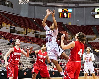 Advertiser photo by Buddy Delahoussaye--Cajuns guard Keke Veal (24) puts the shot up in the first half of the semi-final matchup of the WBI tournament game between Youngstown State and the University of Louisiana at Lafayette on Wednesday night in the Cajun Dome.