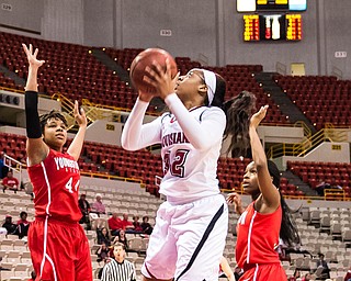 Advertiser photo by Buddy Delahoussaye--Ragin' Cajuns forward Simone Fields (32) with the put back and the basket in the first half of the semi-final matchup of the WBI tournament game between Youngstown State and the University of Louisiana at Lafayette on Wednesday night in the Cajun Dome.