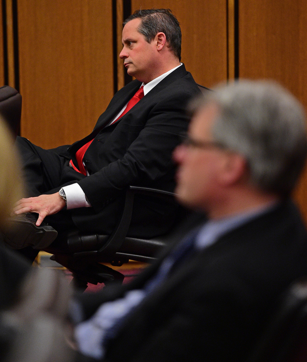 CLEVELAND, OHIO - MARCH 25, 2016: Attorney Martin Yavorcik sits in his chair while the judge gives instructions to the jury during court proceeding Friday afternoon at the Cleveland Municipal Court. DAVID DERMER | THE VINDICATOR
