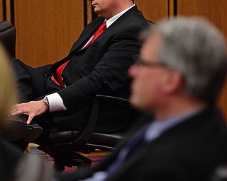 CLEVELAND, OHIO - MARCH 25, 2016: Attorney Martin Yavorcik sits in his chair while the judge gives instructions to the jury during court proceeding Friday afternoon at the Cleveland Municipal Court. DAVID DERMER | THE VINDICATOR