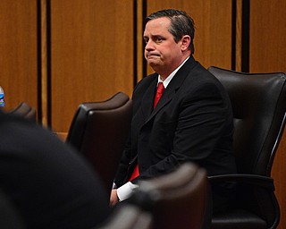 CLEVELAND, OHIO - MARCH 25, 2016: Attorney Martin Yavorcik grimaces upon hearing a guilty verdict on one of costs against him during court proceeding Friday afternoon at the Cleveland Municipal Court. DAVID DERMER | THE VINDICATOR
