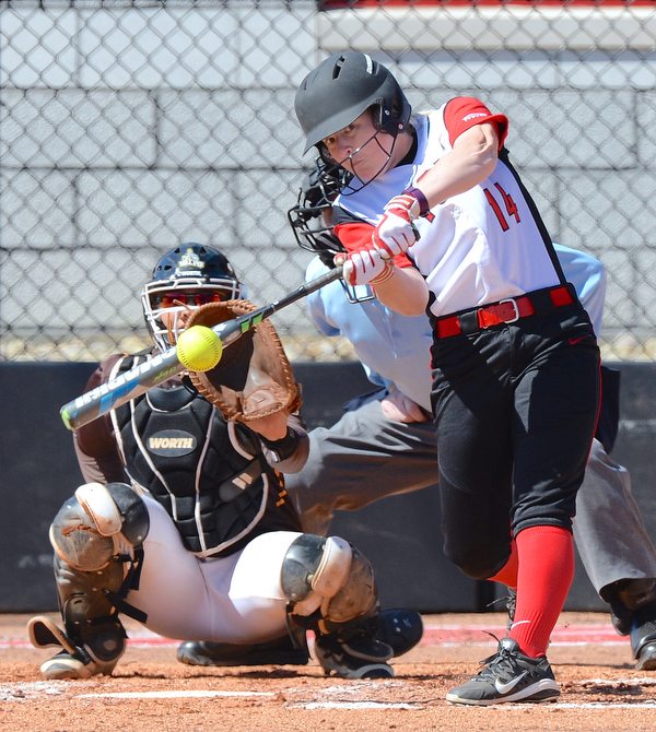 Jeff Lange | The Vindicator  SAT, MAR 26, 2016 - YSU's Sarah Dowd (14) connects with a pitch during Saturday's double header against Valparaiso in Youngstown.