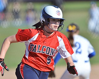Jeff Lange | The Vindicator  TUE, MAR 29, 2016 - Fitch's Lainie Simons (5) rounds third base on her way home to score the first run for the Falcons Tuesday afternoon during a game against Poland Seminary.