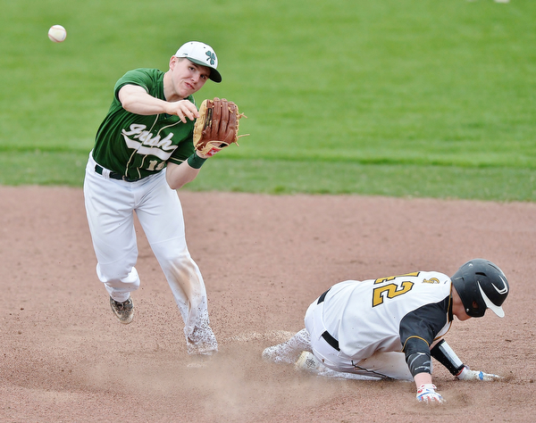 Jeff Lange | The Vindicator  WED, MAR 30, 2016 - Irish second baseman Alex Schlosser (left) attempts to make a double play over Crestview baserunner Caleb Turry (42) in the fifth inning of Wednesday's game in Struthers.