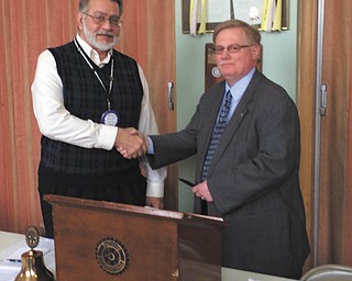 SPECIAL TO THE VINDICATOR | The Struthers Rotary Club meeting on March 1 featured a presentation from John Schlobohm, assistant Scout executive with the Boy Scouts of America Greater Western Reserve Council. Rotarian Al Sauline hosted. Schlobohm shared his 33 years of experience with the Boy Scouts during his speech and highlighted local outreach programs like Scout-reach, a partnership with Down Syndrome Association, and an Exploring/Venturing activity program. He also shared information about positive membership numbers and updates to Scouting’s merit badge system. Information about local Scout programs is available at www.bsa-gwrc.org or by calling 330-898-8474. Rotary president Drew Hirt, left, thanked Schlobohm after his presentation.