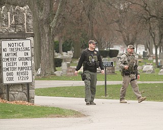     ROBERT K. YOSAY  | THE VINDICATOR..The search for Luis Cruz Ramos  led by the U.S. Marshals Service, which was among the agencies staked out at Lake Park Cemetery on Midlothian Boulevard until about 10 a.m. today. -..--30-.....