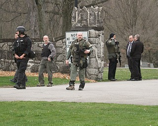      ROBERT K. YOSAY  | THE VINDICATOR..The search for Luis Cruz Ramos  led by the U.S. Marshals Service, which was among the agencies staked out at Lake Park Cemetery on Midlothian Boulevard until about 10 a.m. today. -..--30-.....