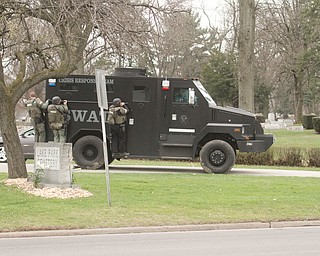      ROBERT K. YOSAY  | THE VINDICATOR..The search for Luis Cruz Ramos  led by the U.S. Marshals Service, which was among the agencies staked out at Lake Park Cemetery on Midlothian Boulevard until about 10 a.m. today. -..--30-.....