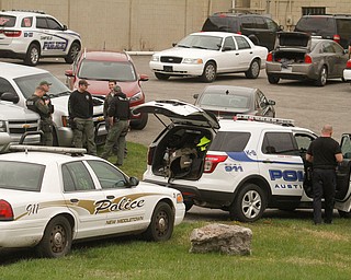      ROBERT K. YOSAY  | THE VINDICATOR..The search for Luis Cruz Ramos  led by the U.S. Marshals Service, which was among the agencies staked out at Lake Park Cemetery on Midlothian Boulevard until about 10 a.m. today. -..--30-.....