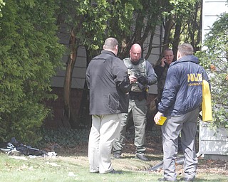      ROBERT K. YOSAY  | THE VINDICATOR..Task Force members and YPD  start the investigation after Ramos was transported to the Hospital.."Members of the US Marshals Northern Ohio Violent Fugitive Task Force were actively searching for Luis R Cruz-Ramos," said Capt. Brad Blackburn in the news release. "He was spotted walking near the 200 block of Lowell Avenue. He fled toward Maywood, holding a handgun as the task force attempted to apprehend him." - .--30-...