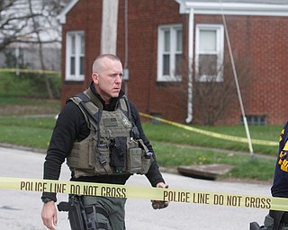      ROBERT K. YOSAY  | THE VINDICATOR.."Members of the US Marshals Northern Ohio Violent Fugitive Task Force were actively searching for Luis R Cruz-Ramos," said Capt. Brad Blackburn in the news release. "He was spotted walking near the 200 block of Lowell Avenue. He fled toward Maywood, holding a handgun as the task force attempted to apprehend him." - .--30-...