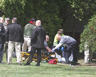      ROBERT K. YOSAY  | THE VINDICATOR.."Members of the US Marshals Northern Ohio Violent Fugitive Task Force were actively searching for Luis R Cruz-Ramos," said Capt. Brad Blackburn in the news release. "He was spotted walking near the 200 block of Lowell Avenue. He fled toward Maywood, holding a handgun as the task force attempted to apprehend him." - .--30-...