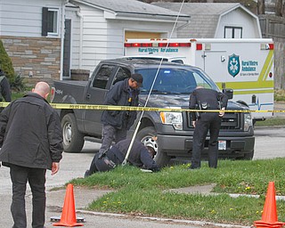      ROBERT K. YOSAY  | THE VINDICATOR.."Members of the US Marshals Northern Ohio Violent Fugitive Task Force were actively searching for Luis R Cruz-Ramos," said Capt. Brad Blackburn in the news release. "He was spotted walking near the 200 block of Lowell Avenue. He fled toward Maywood, holding a handgun as the task force attempted to apprehend him." - .--30-...