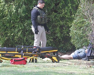      ROBERT K. YOSAY  | THE VINDICATOR.."Members of the US Marshals Northern Ohio Violent Fugitive Task Force were actively searching for Luis R Cruz-Ramos," said Capt. Brad Blackburn in the news release. "He was spotted walking near the 200 block of Lowell Avenue. He fled toward Maywood, holding a handgun as the task force attempted to apprehend him." - .--30-...