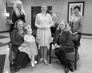 REBECCA DEVEREAUX | The Angels of Easter Seals will host its 39th annual spring fashion show and luncheon May 5. Above, from left, are event chairpersons Susan Berny and Kelly Restle; Madison Antal, 9; Alexis Finocchi, 13; chairperson Mary James Lipinsky; and fashion director Judy Conti; who are making final preparations for the event.