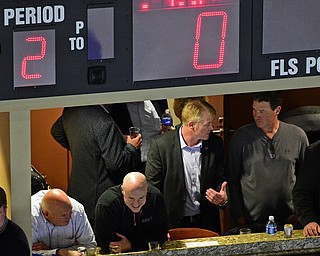 YOUNGSTOWN, OHIO - APRIL 1, 2016: Mario Lemieux has a conversation in a suite with Phantoms Co-Owner Troy Loney during a game between the Omaha Lancers and Youngstown Phantoms Friday night game at Corelli Centre. DAVID DERMER | THE VINDICATOR