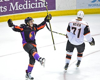 YOUNGSTOWN, OHIO - APRIL 1, 2016: Lukas Craggs #20 of the Phantoms celebrates scoring a power play goal during the 3rd period of Friday nights game at the Covelli Centre. DAVID DERMER | THE VINDICATOR..Matthew Meier #71 of Omaha pictured.