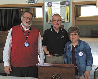 SPECIAL TO THE VINDICATOR | Struthers Rotary President-Elect JoAnne Sweeney, welcomed her husband, Bill Sweeney to the March meeting. Mr. Sweeney described the operation of Crime Stoppers which serves Columbiana, Mahoning and Trumbull counties. He is a Medevac helicopter pilot for UPMC and a volunteer with Crime Stoppers, an international organization of non-law enforcement citizens who assist criminal investigations by providing tips and information to the law enforcement community. Anonymity and cash potential serve as inducements to the general public to get involved and provide information that could assist in the arrest and conviction of criminals. To provide a tip, call 330-746-CLUE. For information visit www.facebook.com/crimestoppers.youngstown. Above, from left, are Struthers President Drew Hirt, Bill Sweeney and JoAnne Sweeney.