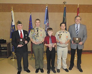 SPECIAL TO THE VINDICATOR |  United Veterans Council held its 75th annual banquet at the Immaculate Heart of Mary Parish center in Austintown. Among those honored was Fred Schrok as Veteran of the Year, Dr. Robert Marcus as Citizen of the Year, and Brandon Colangelo, Seth Welsh, and Scotty Crawford as Citizen Youth of the community. Schrok served in the U.S. Army in Vietnam as a medical corpsman and is also a lifetime member of the VFW of Ellsworth and serves as the coordinator for the Funeral Honor Guard. Welsh is an Eagle Scout who designed and constructed five military silhouettes and a flag pole in the courtyard by the main entrance of Fitch High School for his Eagle project. Crawford, a sixth grader from Canfield, helped raise funds for the renovation of the Canfield War Veterans Museum. Colangelo, also an Eagle Scout, designed and constructed a flag disposal pit at Wickliffe Circle Veterans Park in Austintown. Dr. Marcus, right, has worked to assist the VA Outpatient Clinic and also serves as the coordinator of the Homeless Outreach program.
