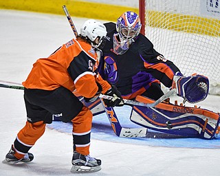 YOUNGSTOWN, OHIO - APRIL 2, 2016: Goalie Colin DeAugustine #31 of the Phantoms slides to his right to deny Patrick Harper #9 of the Lancers a break away goal during the 3rd period of Saturday nights game at the Corelli Centre. DAVID DERMER | THE VINDICATOR