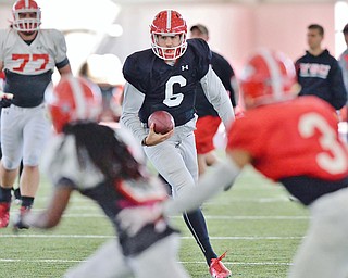 Jeff Lange | The Vindicator  SAT, APRIL 2, 2016 - YSU quarterback Hunter Wells (6) rushes for yards during Saturday's practice in Youngstown.