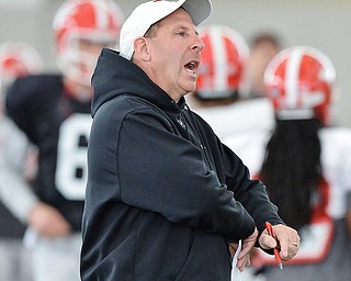 Jeff Lange | The Vindicator  SAT, APRIL 2, 2016 - Youngstown State University head football coach Bo Pelini expresses his frustration during practice Saturday morning at the Watson and Tressel Training Site in Youngstown.