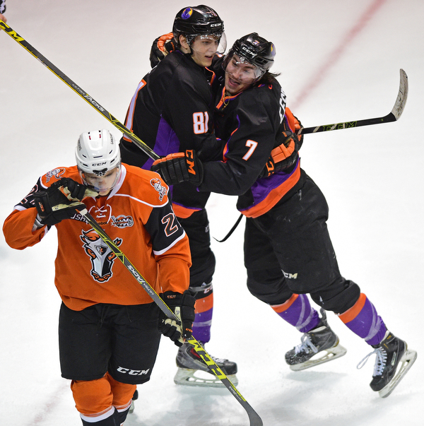 YOUNGSTOWN, OHIO - APRIL 2, 2016: Eric Esposito #7 of the Phantoms is congratulated by teammate Garrett Hall #81 after scoring the 1st goal of the game during the 1st period of Saturday nights game at the  Covelli Centre. DAVID DERMER | THE VINDICATOR..Jake Massie #27 of the Lancers pictured.