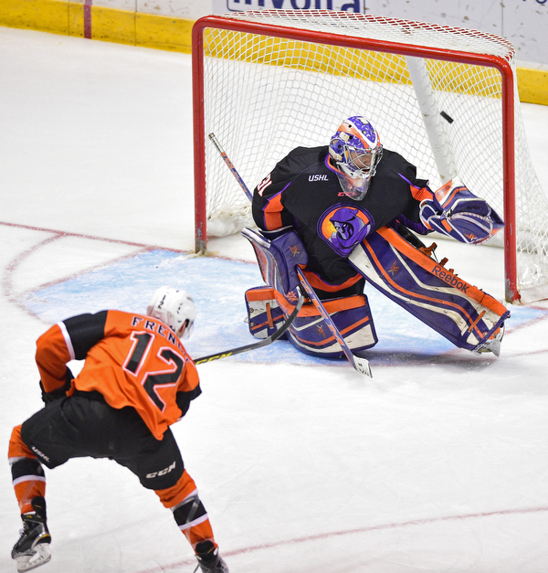 YOUNGSTOWN, OHIO - APRIL 2, 2016: Goalie Colin DeAugustine #31 of the Phantoms deflects the shot from Josh French #12 of the Lancers during the 1st period of Saturday nights game at the  Covelli Centre. DAVID DERMER | THE VINDICATOR.
