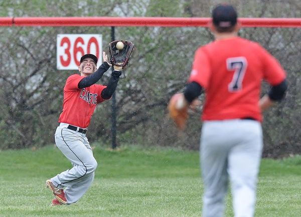 Jeff Lange | The Vindicator  WED, APRIL 6, 2016 - Canfield center fielder Matt Pappas catches a fly ball in the fourth inning against Austintown Fitch Wednesday afternoon in Canfield.