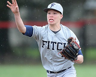 Jeff Lange | The Vindicator  WED, APRIL 6, 2016 - Fitch second baseman Kole Klasic makes a toss to first to put out a Canfield batter in the fourth inning of Wednesday's game at Canfield High School.