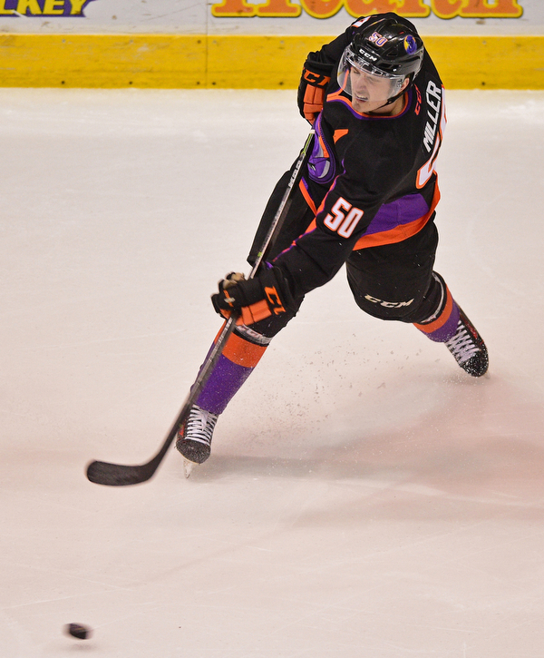 YOUNGSTOWN, OHIO - APRIL 9, 2016: Matt Miller #50 of the Phantoms takes a shot during the first period of Saturday nights game at the Corelli Centre. DAVID DERMER | THE VINDICATOR