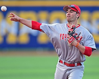 KENT, OHIO - APRIL 13, 2016: Second basemen Billy Salem #18 of YSU throws the ball to first base to turn a double play after catching a fly ball to end the bottom of 3rd inning during Wednesday nights game at Schooner Stadium. DAVID DERMER | THE VINDICATOR