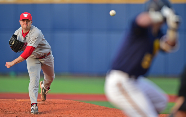 KENT, OHIO - APRIL 13, 2016: Pitcher Colin Ford #24 of YSU throws a pitch during the bottom of the 4th inning during Wednesday nights game at Schooner Stadium. DAVID DERMER | THE VINDICATOR