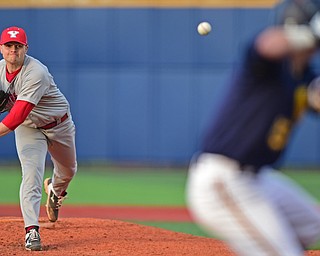 KENT, OHIO - APRIL 13, 2016: Pitcher Colin Ford #24 of YSU throws a pitch during the bottom of the 4th inning during Wednesday nights game at Schooner Stadium. DAVID DERMER | THE VINDICATOR